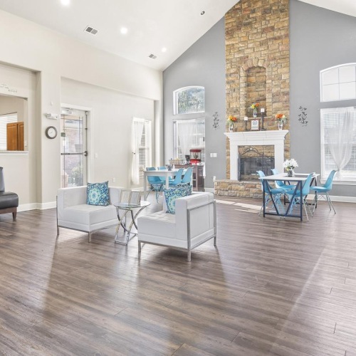 a large living room with a fireplace